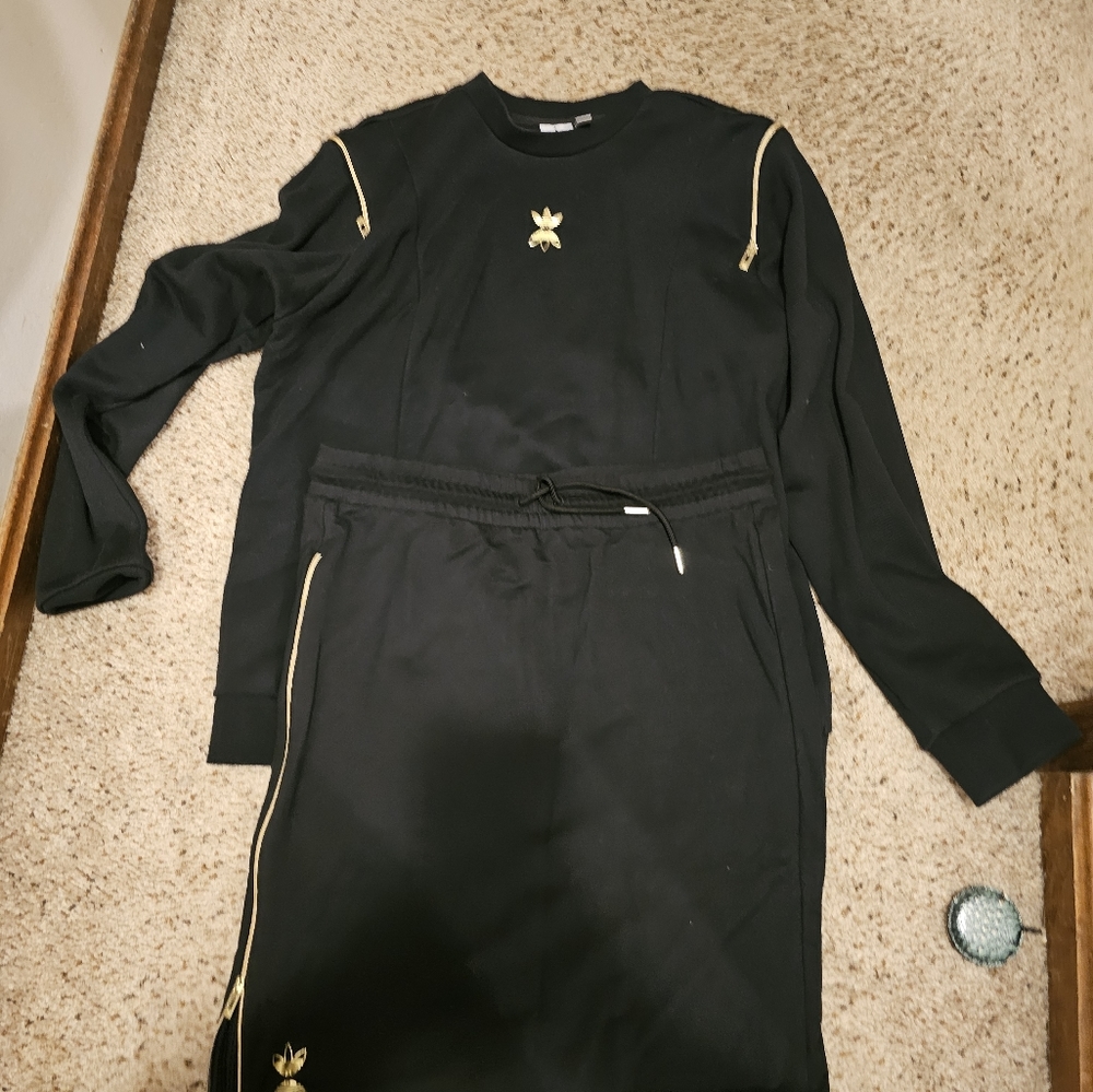 Adidas Women's Black and Gold shirt and skirt